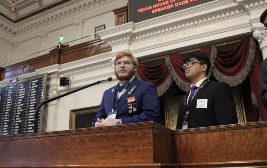 Government Day speakers at the speaker's chair in the House of Representatives.